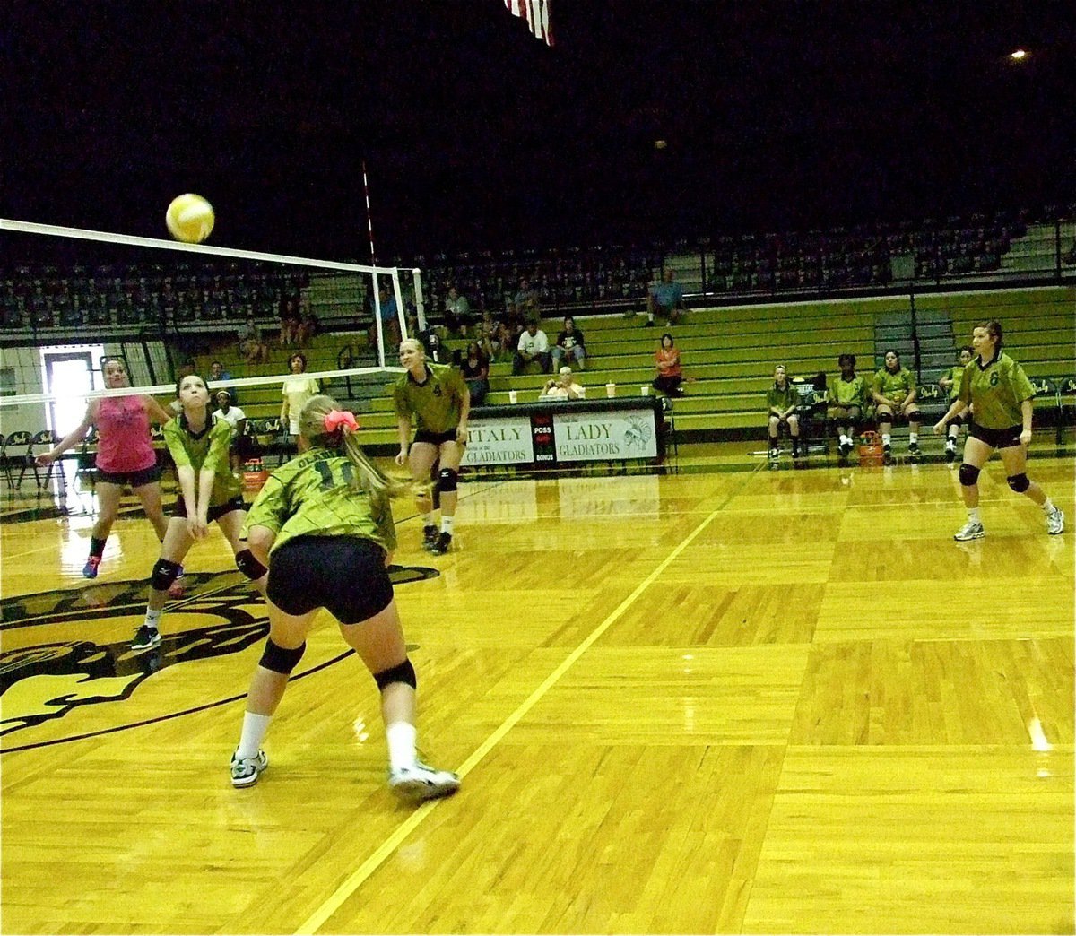 Image: Paola Mata(2) keeps the ball in play with teammates Madison Washington(10), Jaclynn Lewis(4) and Morgan Cockerham(6) closing in.