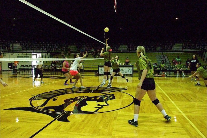 Image: Lady Gladiator Madison Washington takes on Megann and Cassi at the net.