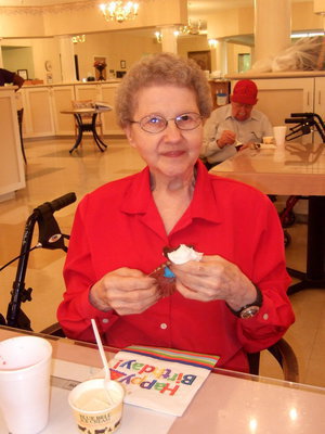 Image: Joyce Cupp (birthday girl) is celebrating her birthday with cupcakes and ice cream.