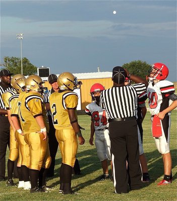 Image: The coin toss: JV Captains Marvin Cox(2), John Byers(71), Kyle Fortenberry(66) and Ryan Connor(13) represent Italy’s JV Gladiators.