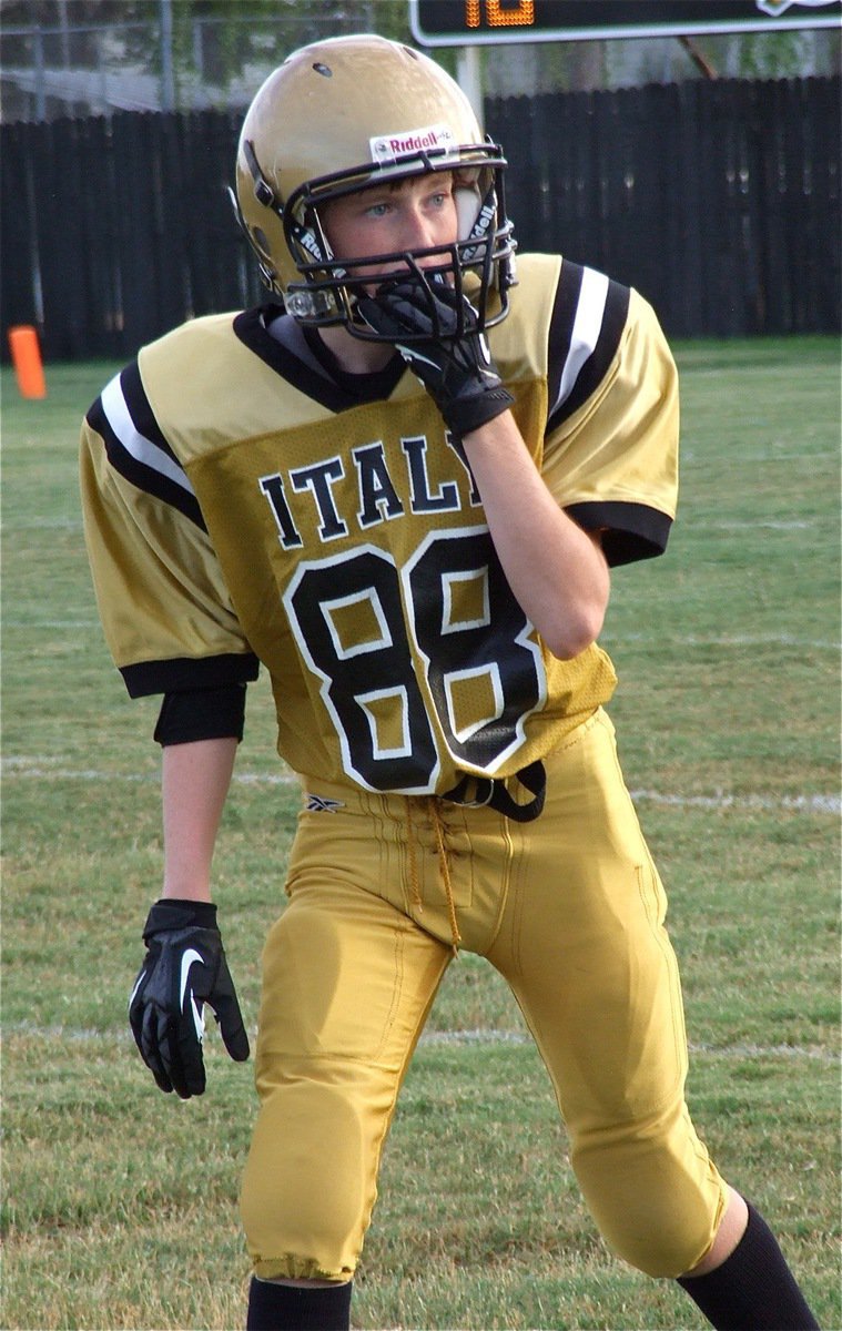 Image: Clayton Miller(88) lines out at wide receiver for Italy’s JV.