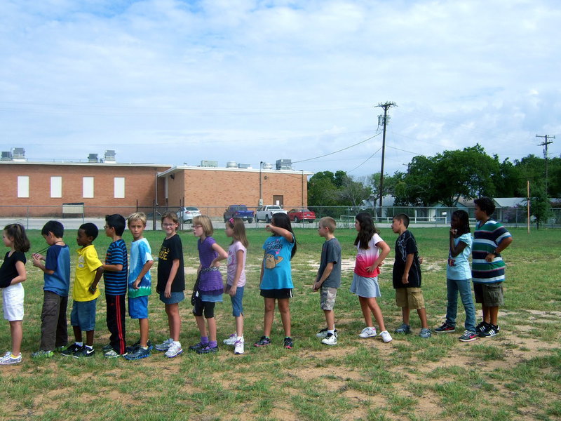 Image: This team did it! They have the smallest to the tallest and in line!