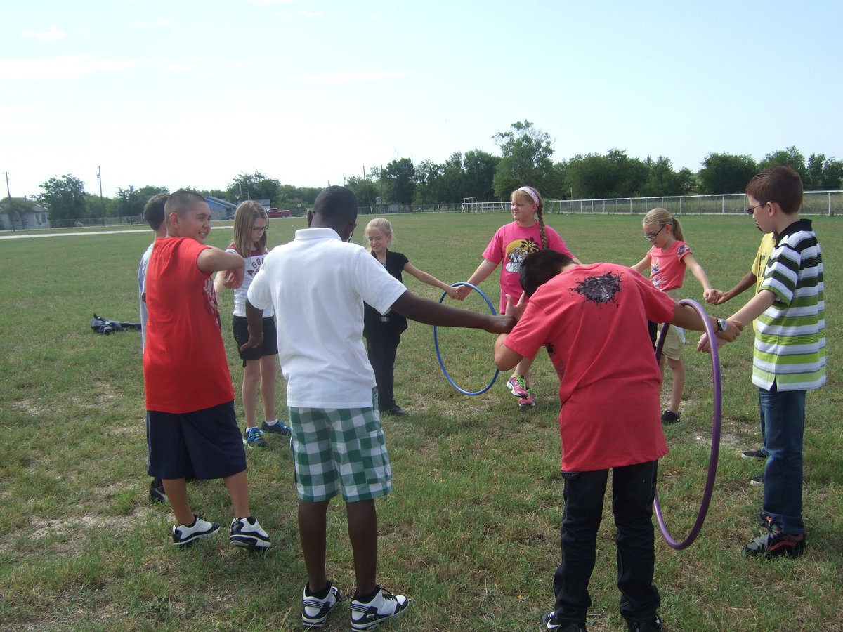 Image: How are we going to pass this hoop with out breaking hands?