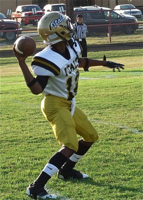 Image: Gladiator quarterback Eric Carson(12), a junior, had a golden arm against the Panthers.