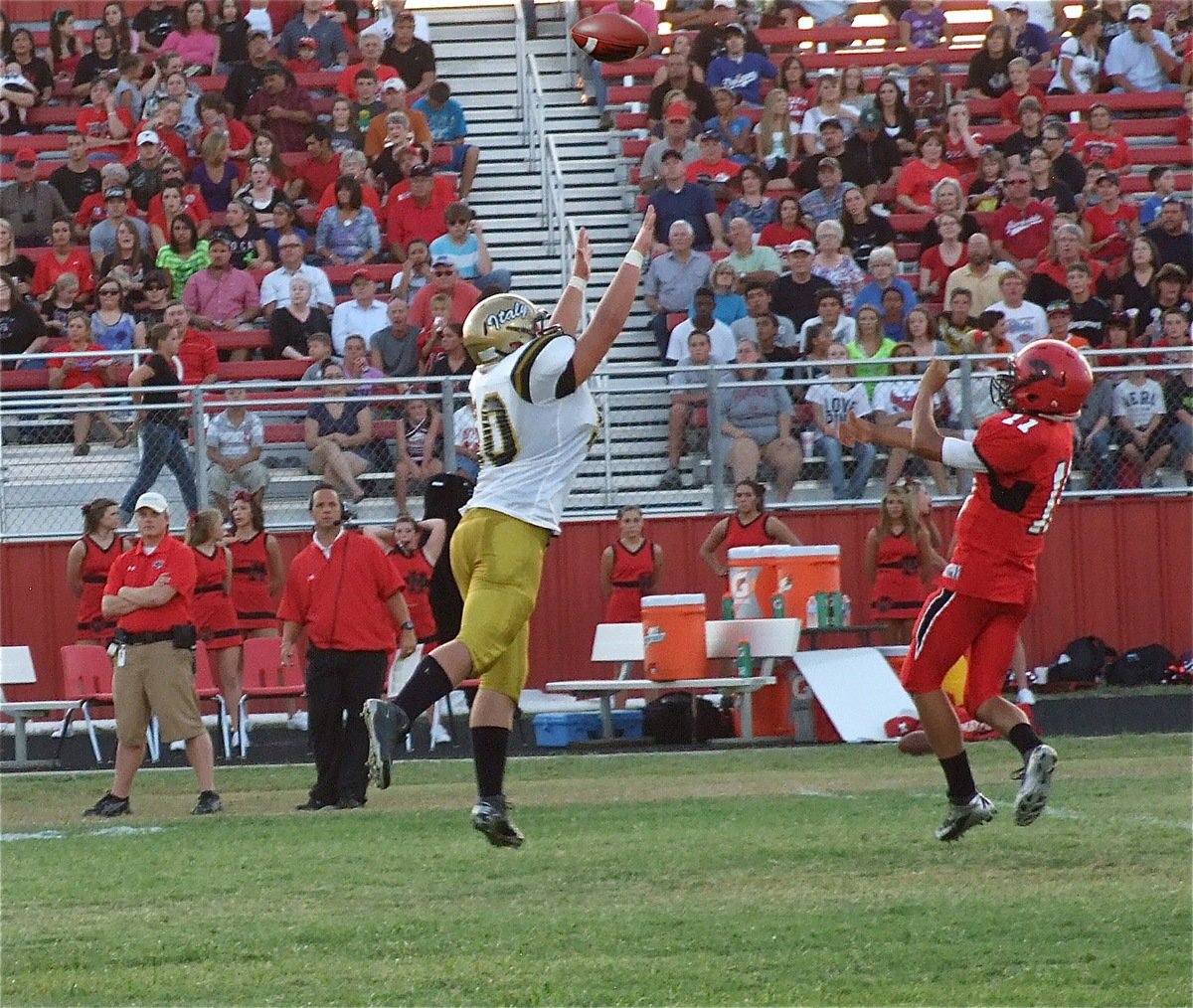 Image: Italy’s Zain Byers, a junior, goes after Maypearl’s quarterback Nick Gonzalez(11) and forces an incomplete pass out-of-bounds.