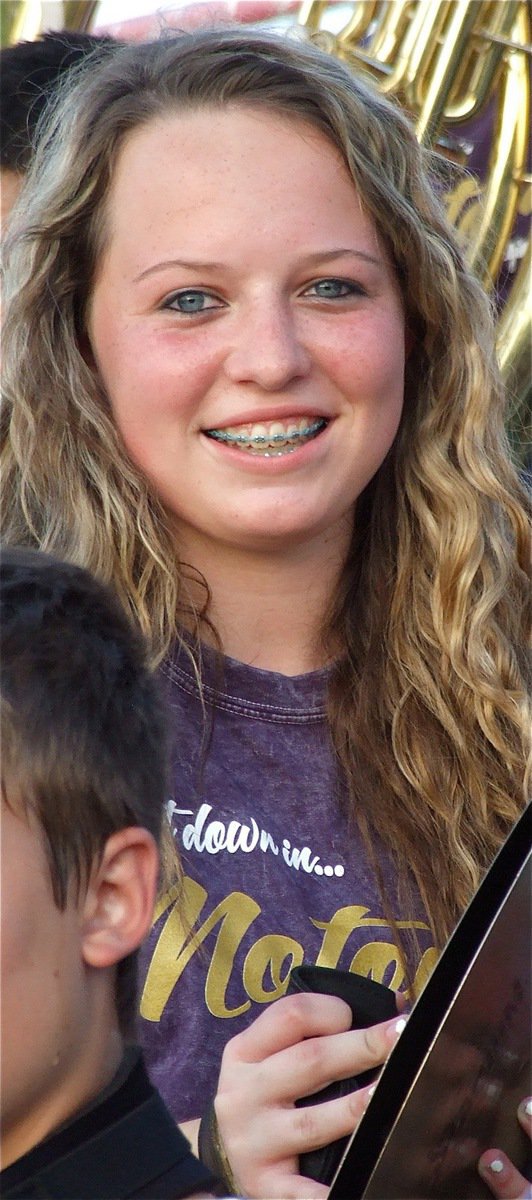 Image: Gladiator Regiment Marching Band member Maddie Pittman and her cymbals