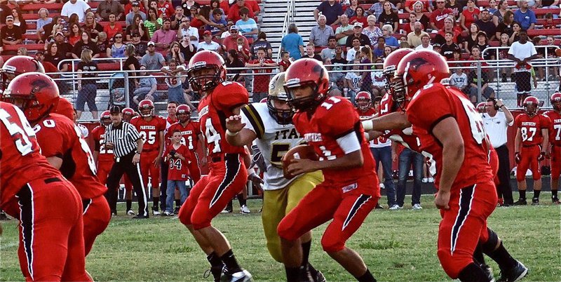 Image: Defensive tackle Zain Byers(50) sneaks thru Maypearl’s protection to get the sack.