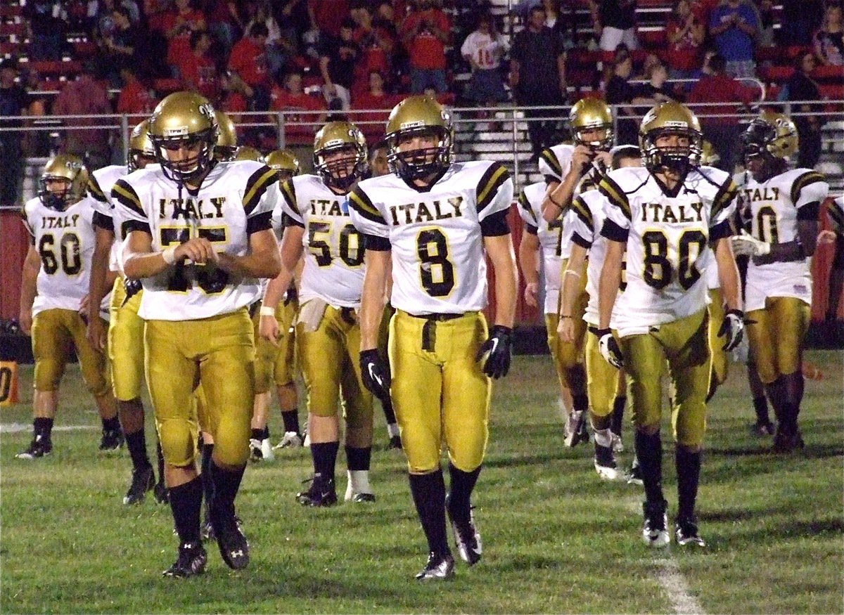 Image: Just another game at the office for Cody Medrano(75), Hayden Woods(8) and Kelvin Joffre(80) as Italy wins their 2012 season opener over Maypearl 41-14.