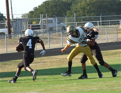Image: Ryan Conor(13) draws a holding penalty against Malakoff.