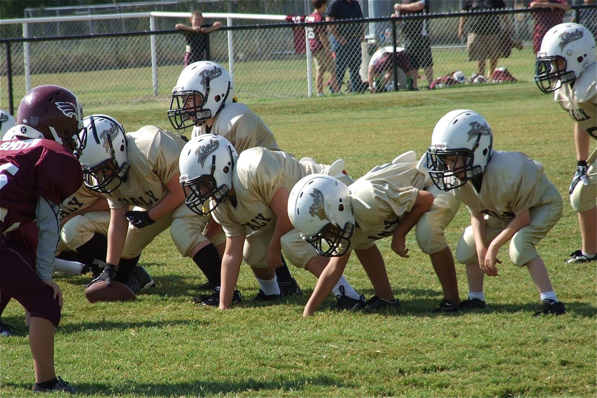 Image: The IYAA B-Team Gladiators offensive line is ready to blast Eagle defenders.