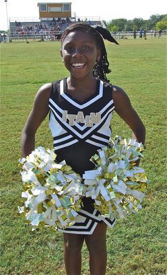 Image: IYAA B-team cheerleader Liyah Hall takes a moment for photo.