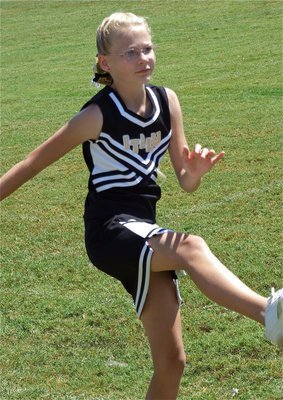 Image: IYAA A-team cheerleader Taylor Boyd kicks up some team spirit.