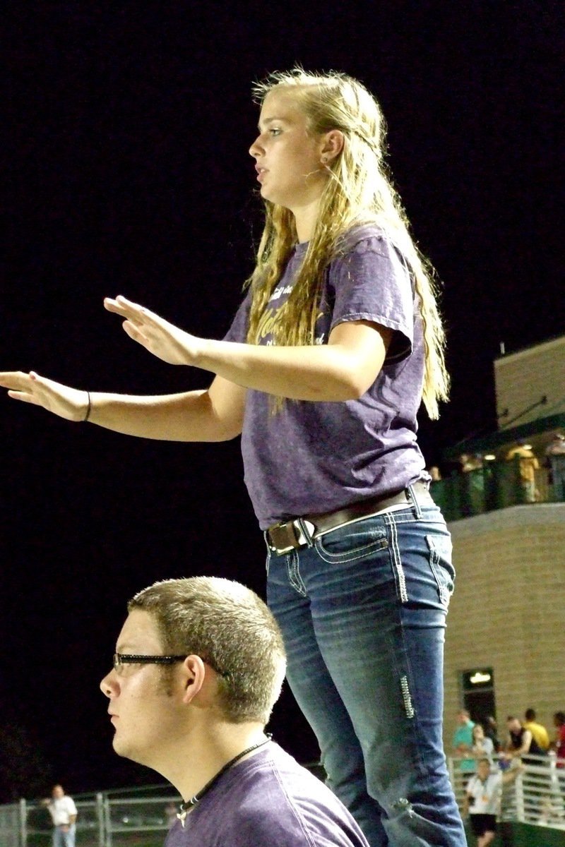 Image: Assistant drum major Madison Washington directing the band.