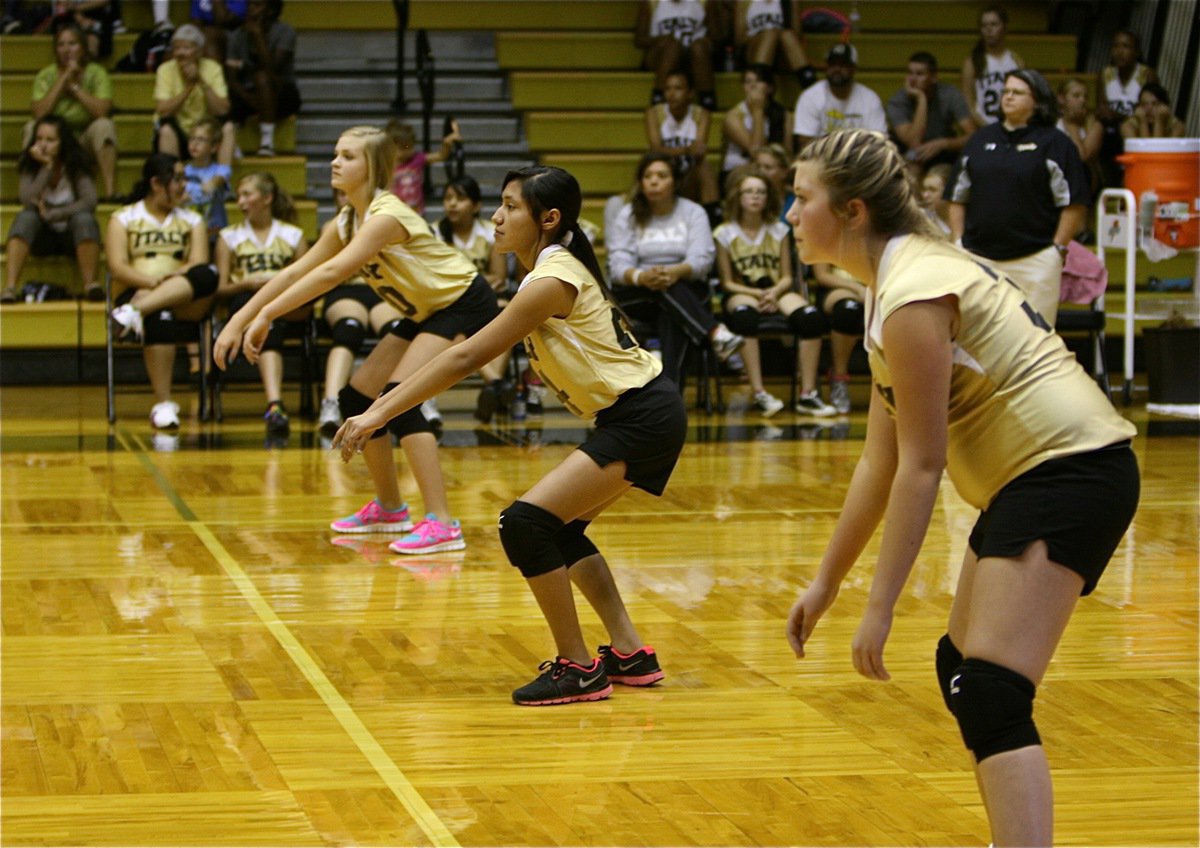 Image: Italy 7th Graders await the Milford serve during the Junior High Games played inside Italy Coliseum.