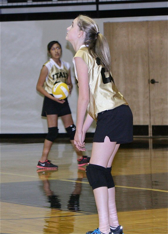Image: Italy 7th Grader Kirby Nelson glares up at the scoreboard during a close match with MIlford.
