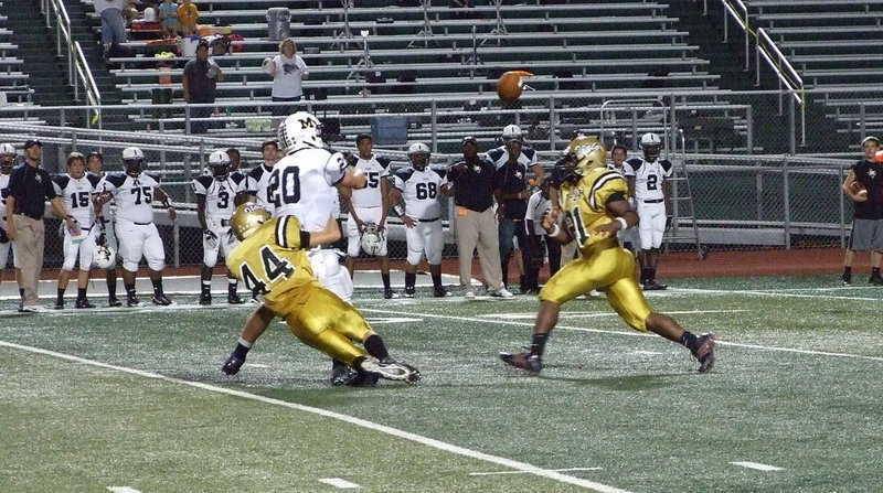 Image: Justin Wood(44) forces Malakoff’s quarterback to throw the ball away.