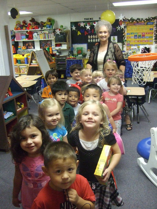 Image: Sue Morrison with her pre-K-3 students.