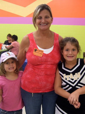 Image: Teresa Medlen and her two granddaughters Mayson and Taylor.