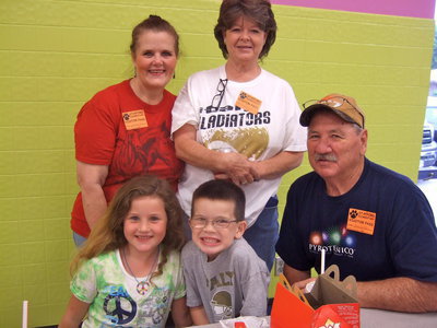 Image: Mrs Cate, Mrs. Chambers and Mr. Cate all celebrating Grandparents Day with their Grandchildren.