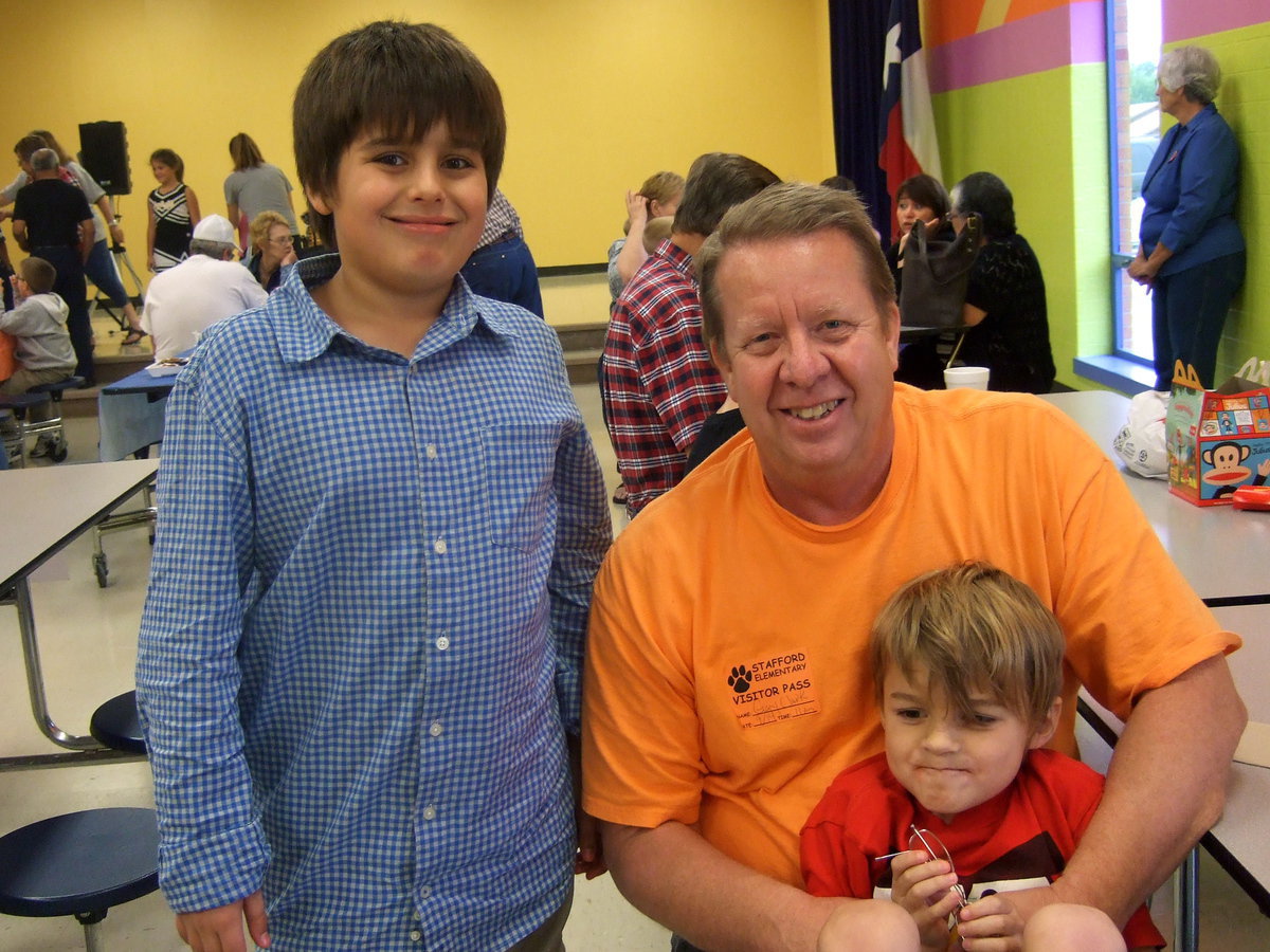 Image: Mikey South and Gary Clark and Frankie South enjoying lunch together for Grandparents Day.