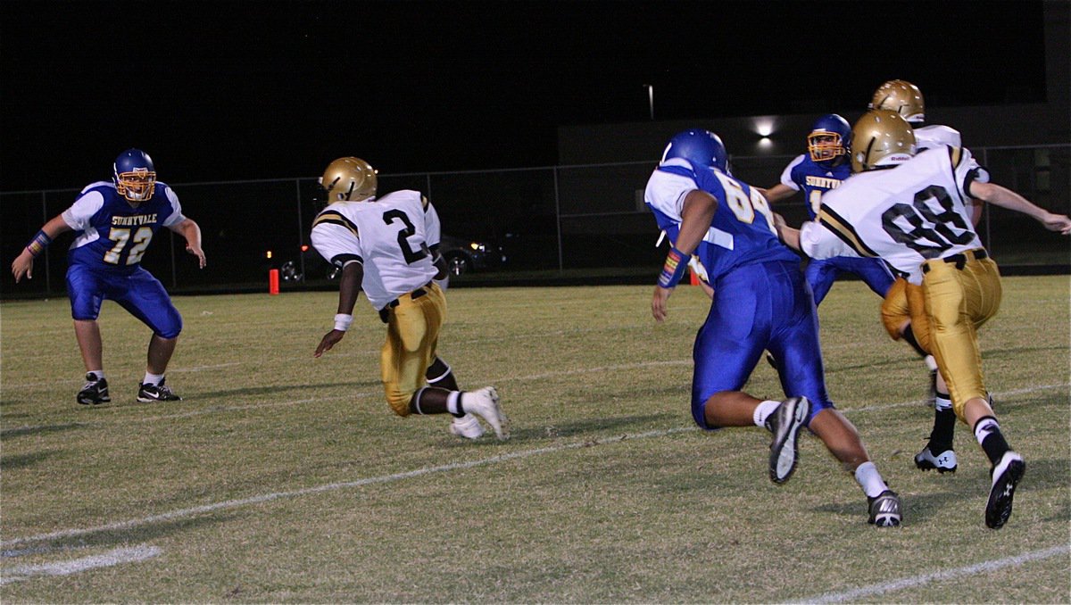 Image: Marvin Cox(2) returns the interception into Sunnyvale territory.