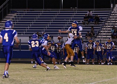 Image: Italy’s John Escamilla(63) wisely hits the intended Sunnyvale receiver before the ball arrives to force an incomplete pass. As long as the receiver is behind the L.O.S. he is fair game.