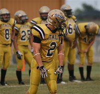 Image: Italy senior Chase Hamilton(2) lines up at receiver during pre game warmups before the Gladiators take on Sunnyvale.