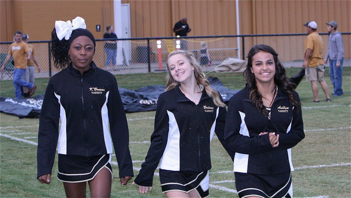 Image: Lady Gladiator cheerleaders K’Breona Davis, Britney Chambers and Ashlyn Jacinto.