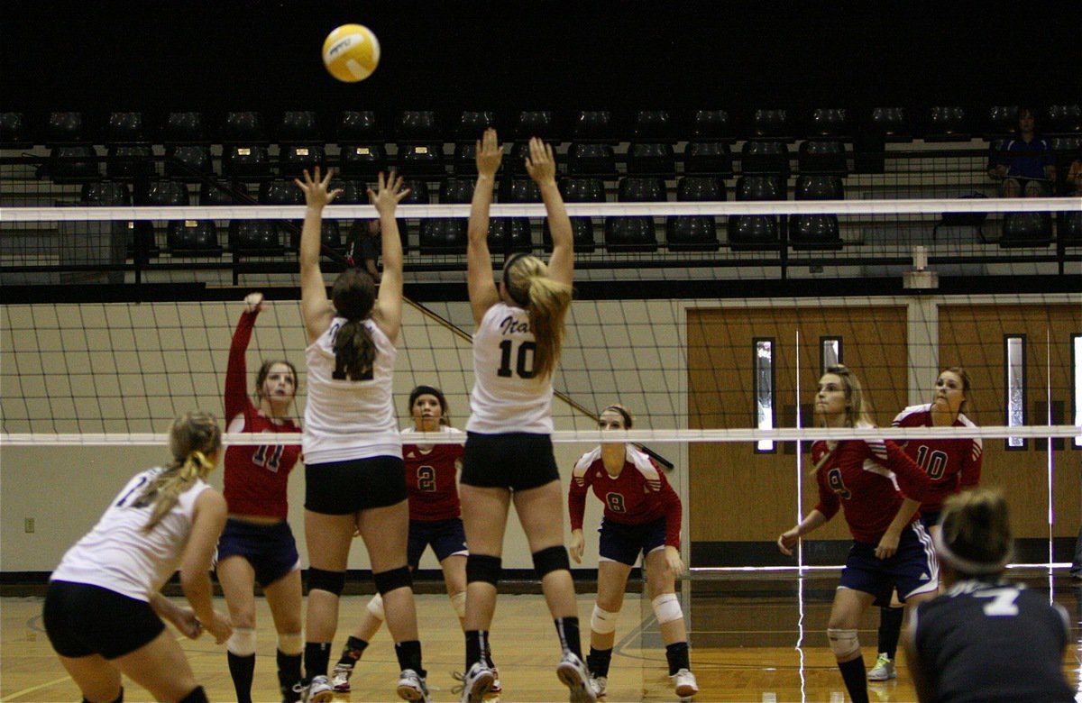 Image: Lady Gladiators Paige Westbrook(12) and Madison Washington(10) create a wall to stop Kopperl.