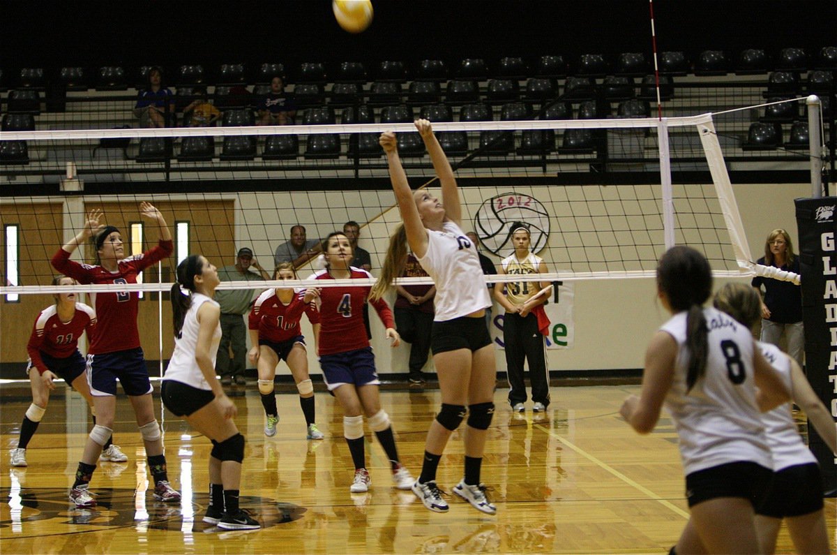 Image: Lady Gladiator Madison Washington(10) uses her athleticism to keep the volley going during Saturday’s matchup against Kopperl. Italy played at home in the dome against Avalon on Tuesday to sweep the Lady Eagles and improve their district record to 2-2.