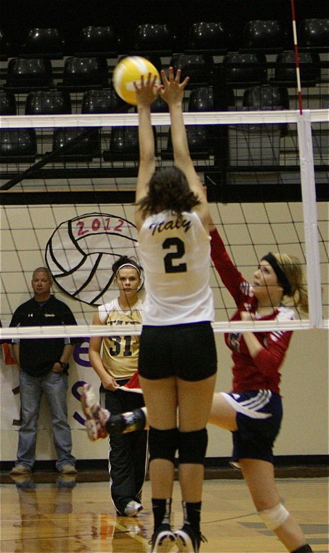 Image: Italy’s Paola Mata(2) shows her versatility by making the block at the net.