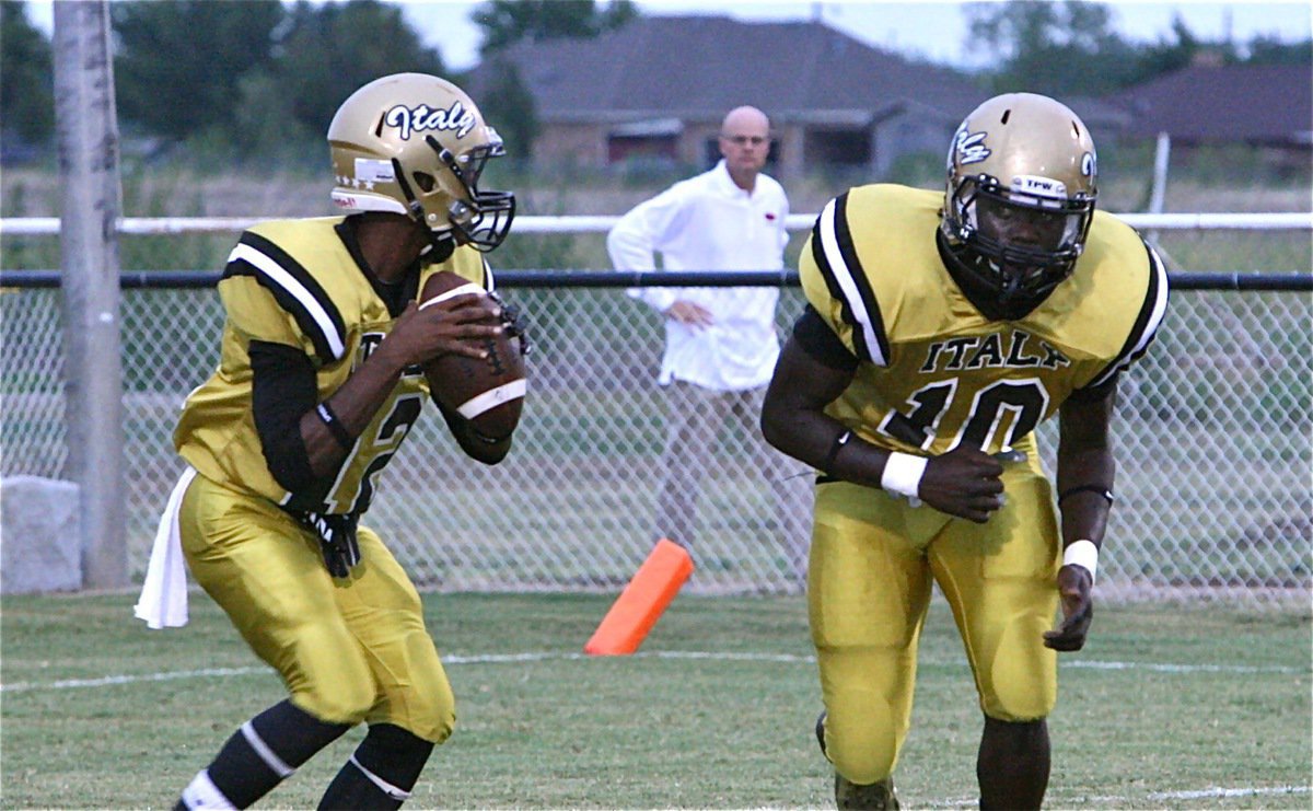 Image: Gladiators Eric Carson(12) and Ryheem Walker(10) get ready for the Raiders.