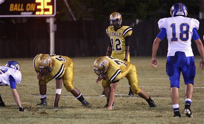 Image: Italy’s Darol Mayberry(58) and Cody Medrano(75) are ready to block for junior quarterback Eric Carson(12).