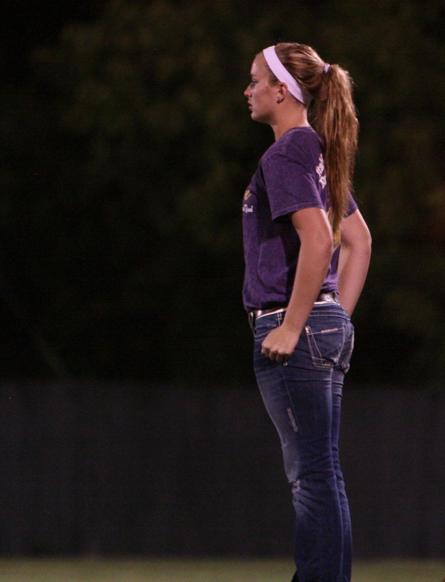 Image: Assistant Drum Major Maddy Washington commands attention up on the podium.