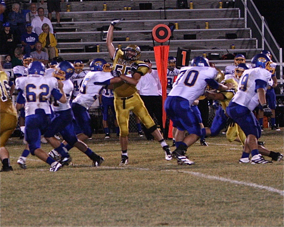 Image: Defensive tackle Zackery Boykin(55) attempts to knock down a Raider pass.