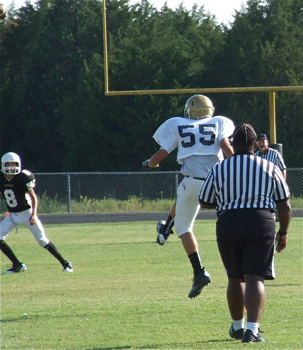 Image: David De La Hoya(55) kicks off to Hubbard after an Italy touchdown.