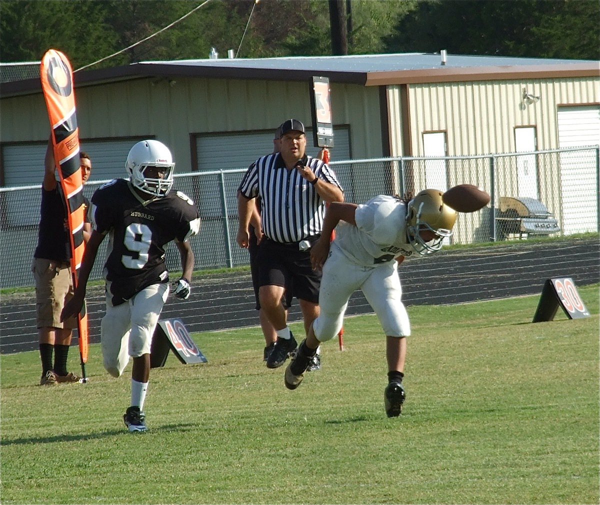 Image: Breaking up a Jaguar pass attempt is Devonteh Williams(9).