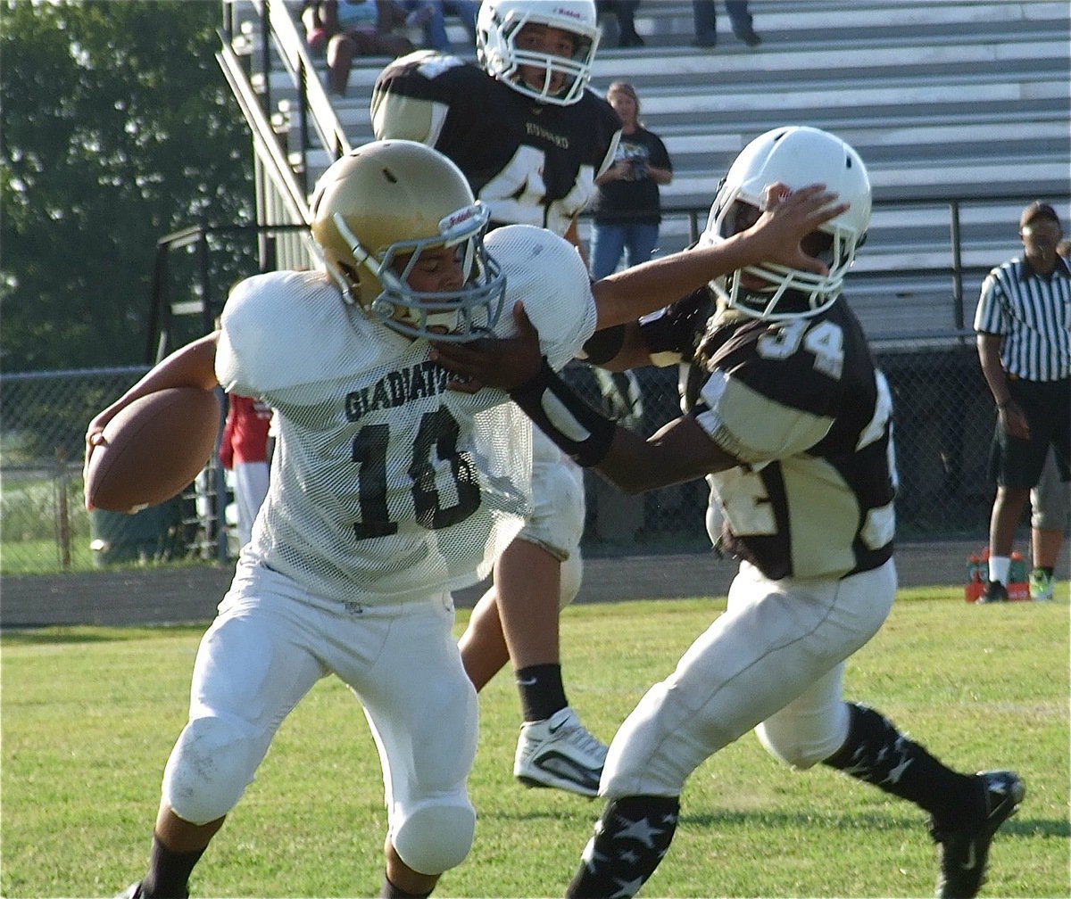 Image: Tylan Wallace(10) tries to elude a Hubbard defender.