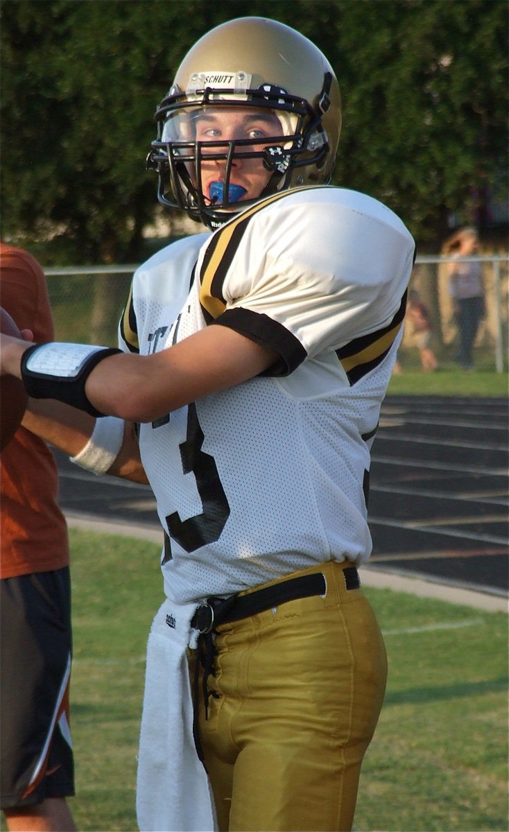 Image: JV quarterback Ryan Connor(13) prepares to lead Italy to a win over Hubbard.