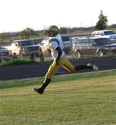 Image: Marvin Cox(2) catches a pass from Ryan Connor and then sprints into the end zone for a touchdown.