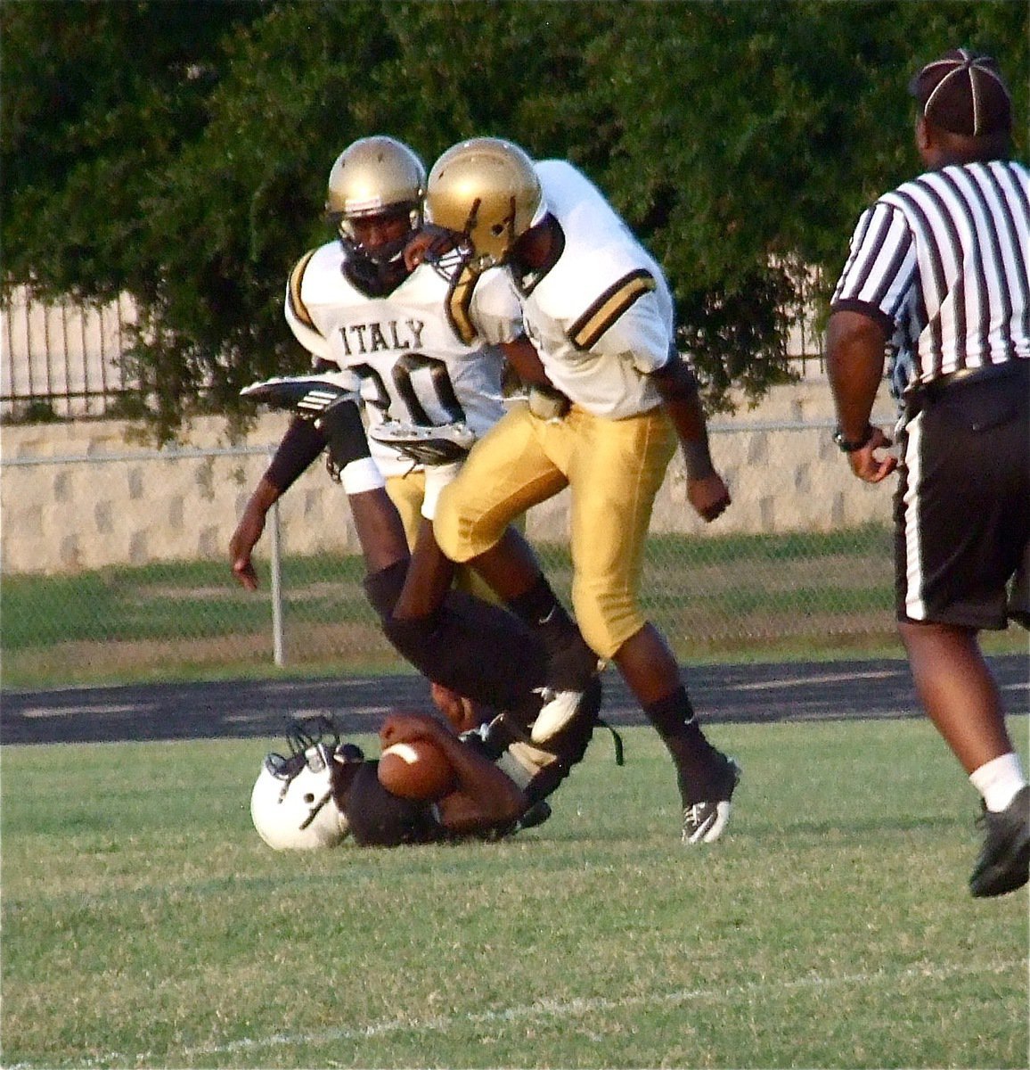 Image: Marvin Cox(2) drops a Hubbard back after the Jaguar runner made a lengthy gain.