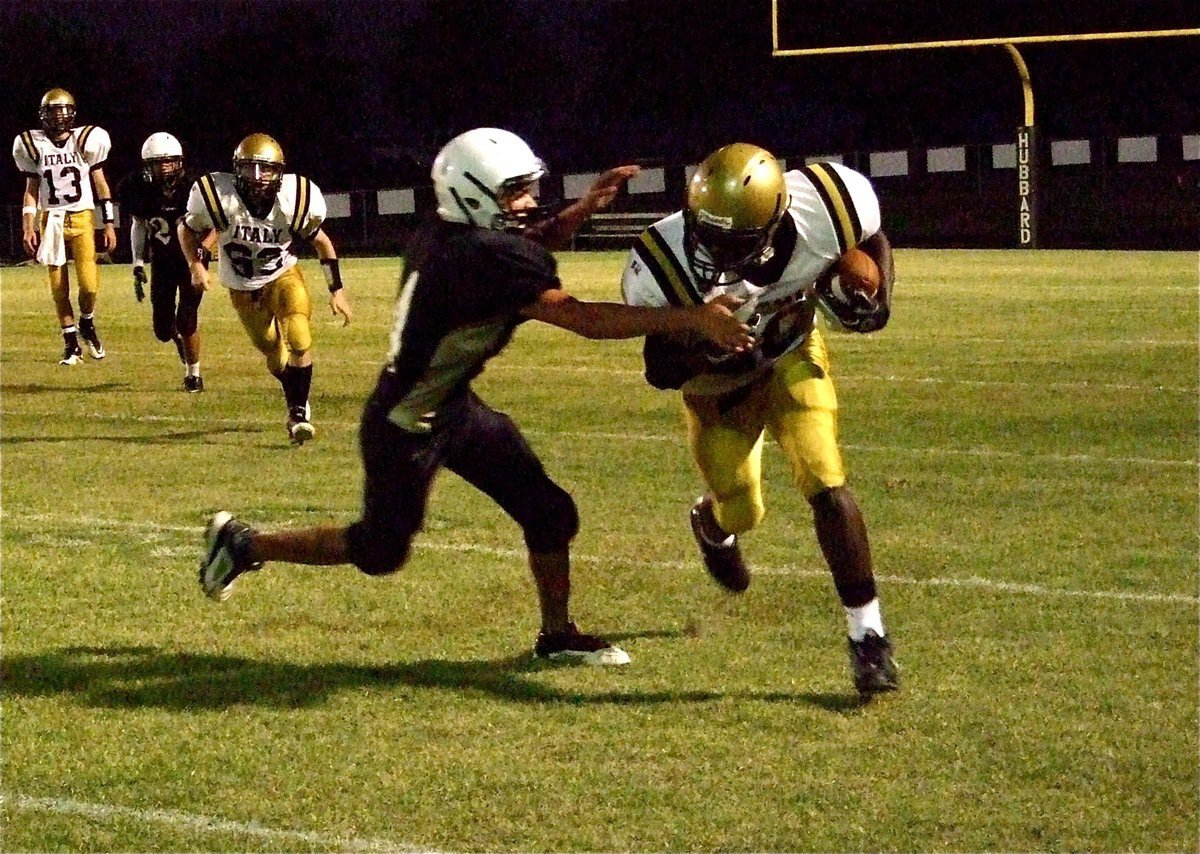 Image: Tyvion Copeland(20) makes the catch, breaks a tackle and then goes 78-yards for an Italy touchdown in the fourth-quarter.