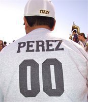 Image: Gladiator Regiment Marching Band director, Jesus Perez, sports the number originally made famous by Jim Otto, the center for the Oakland Raiders from 1960-1974. The AFL permitted the unusual number because it was a pun on Otto’s name (aught-oh) which he began wearing in 1961.