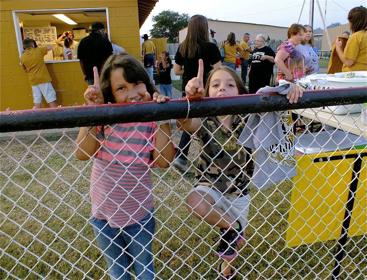 Image: Some Gladiator fans are just excited they can finally see over the fence!