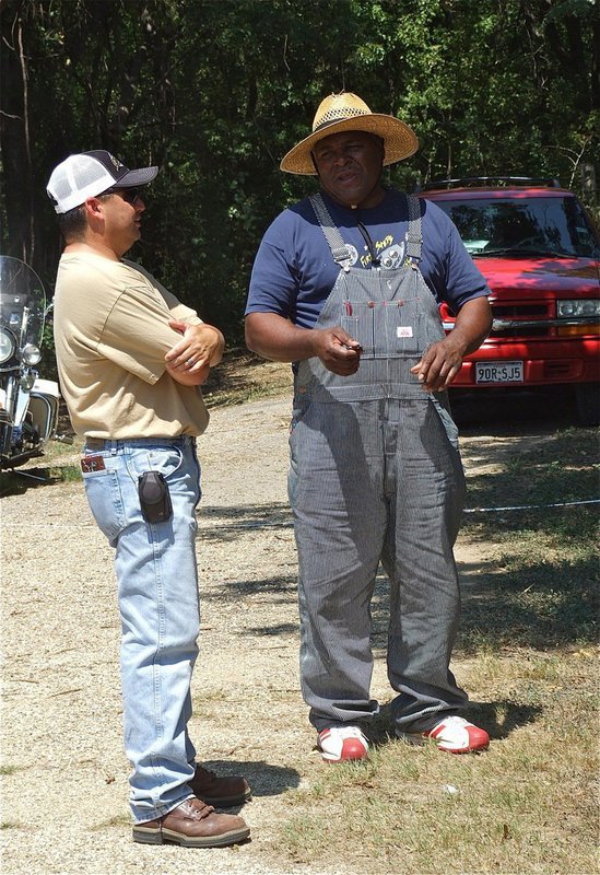 Image: Italy’s Jason Escamilla and Blooming Grove’s Willie Pyburn agree something must be done to protect St. Mary Cemetery as well as other old cemeteries around the state.