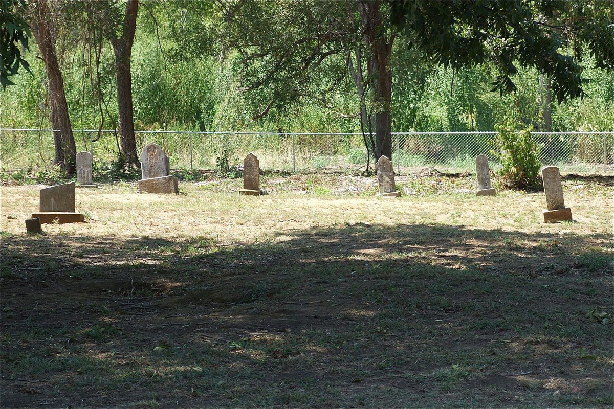 Image: A view of remaining headstones that survived the actions of the bulldozers.