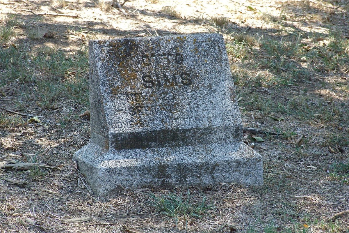 Image: Elmerine Bell and fellow activists are determined to ensure those buried inside St. Mary Cemetery, such as Otto Sims (1897-1927), rest in peace.