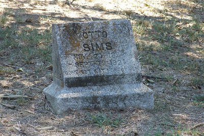 Image: Elmerine Bell and fellow activists are determined to ensure those buried inside St. Mary Cemetery, such as Otto Sims (1897-1927), rest in peace.