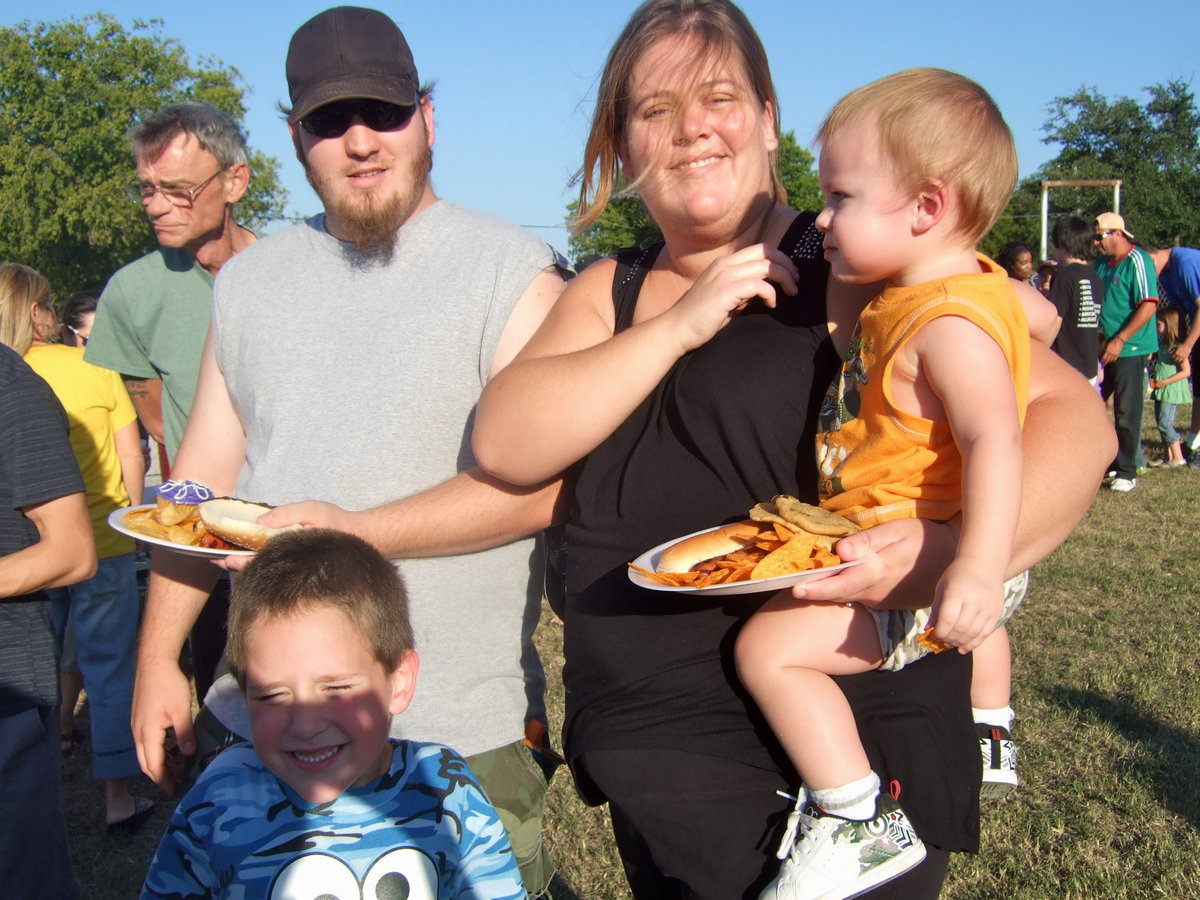 Image: Josh and Janna Weaver with their two boys Landon, five years old and Hunter eighteen months.