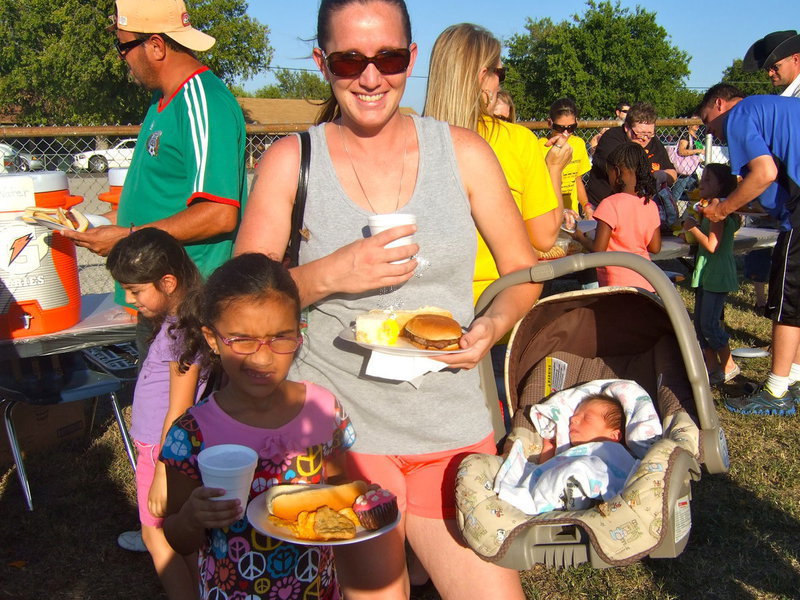 Image: Sicily Johnson, Stephanie Latimer and baby Sean out for a good time.